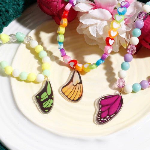 Pendants, Butterfly Wings, Fuchsia, Resin, 36mm - BEADED CREATIONS